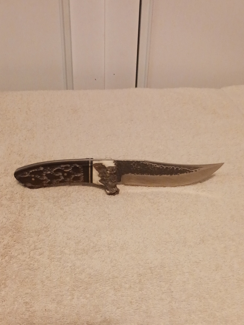 Handheld Decorative Hunting Knife with Brown Handle and Silver Blade